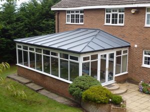 Large conservatory with a GRP fibreglass roof